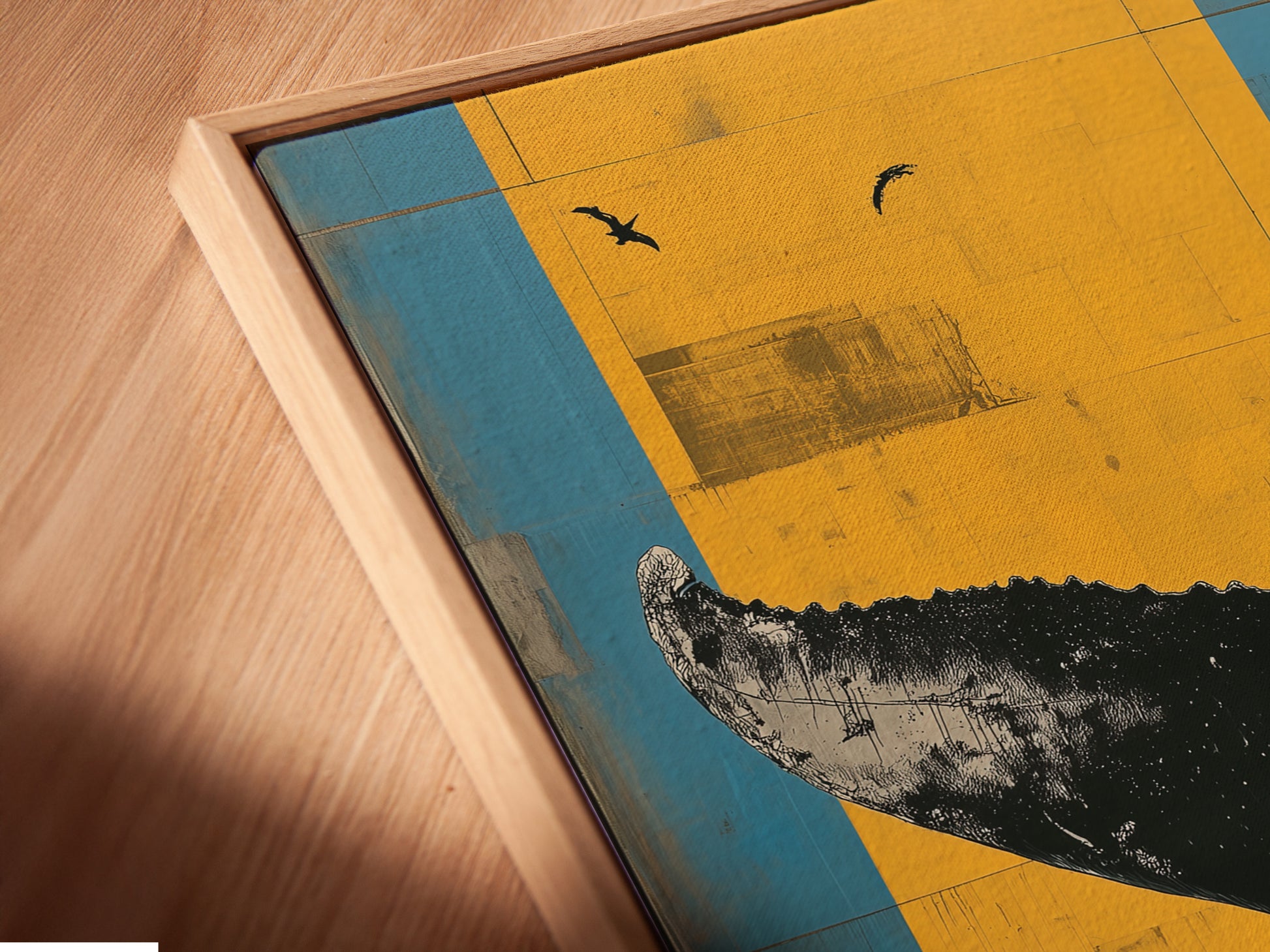 Close-up of a Whale Tail canvas print in a floating frame. The artwork has blue and yellow colors. This marine art enhances any room. Perfect for adding a coastal touch. The whale print is a great focal point.