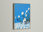 The floral canvas art looks stunning in an oak frame. This azure blue wall art is a botanical print. It will enhance your entryway wall decor. The flower artwork offers a modern touch.