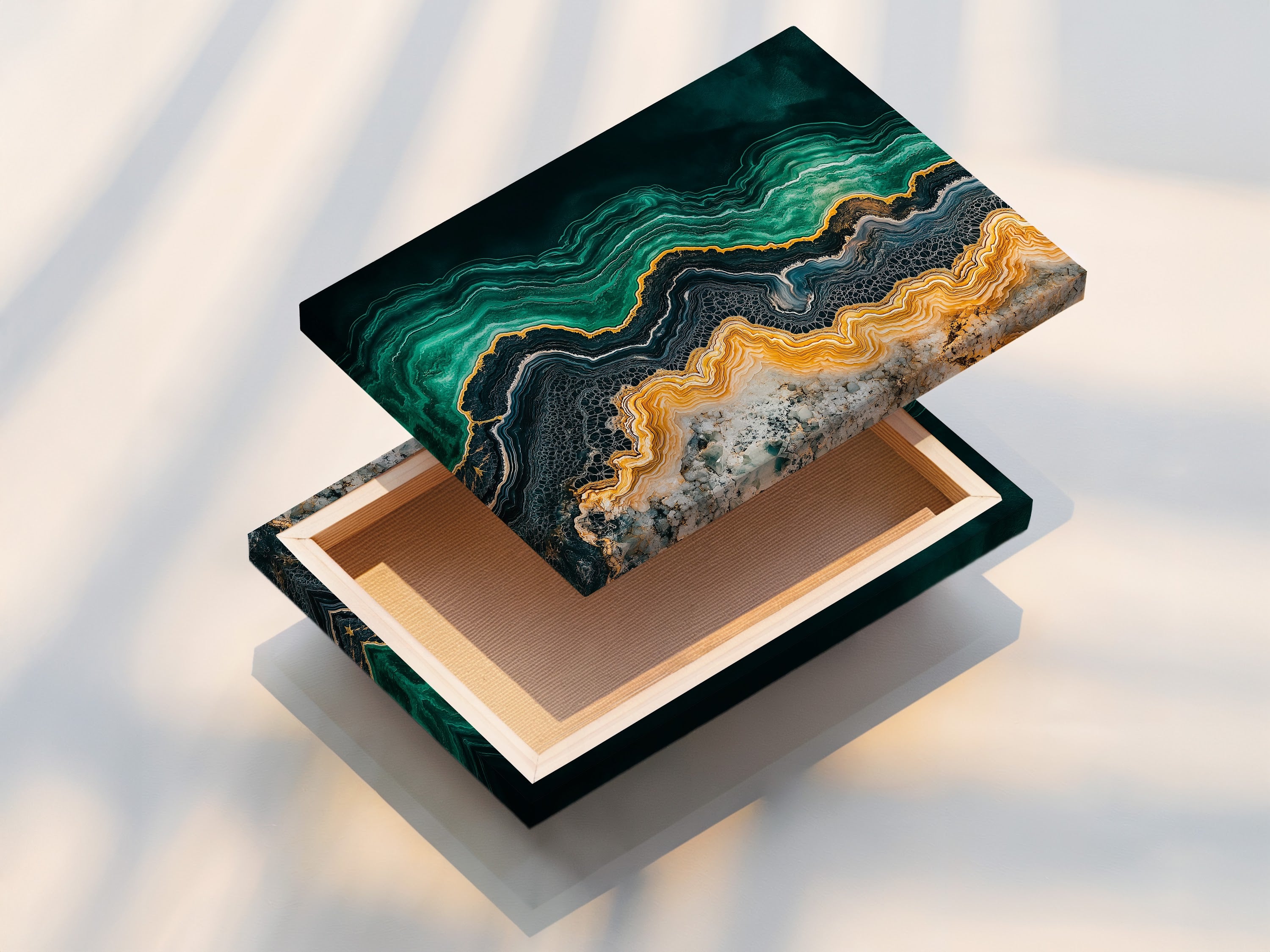A stretched canvas print displays an abstract ocean artwork. The emerald green teal and gold colors create a fluid artwork effect. The stretched canvas provides a gallery-worthy look. Add a touch of elegance to your home with this modern piece.