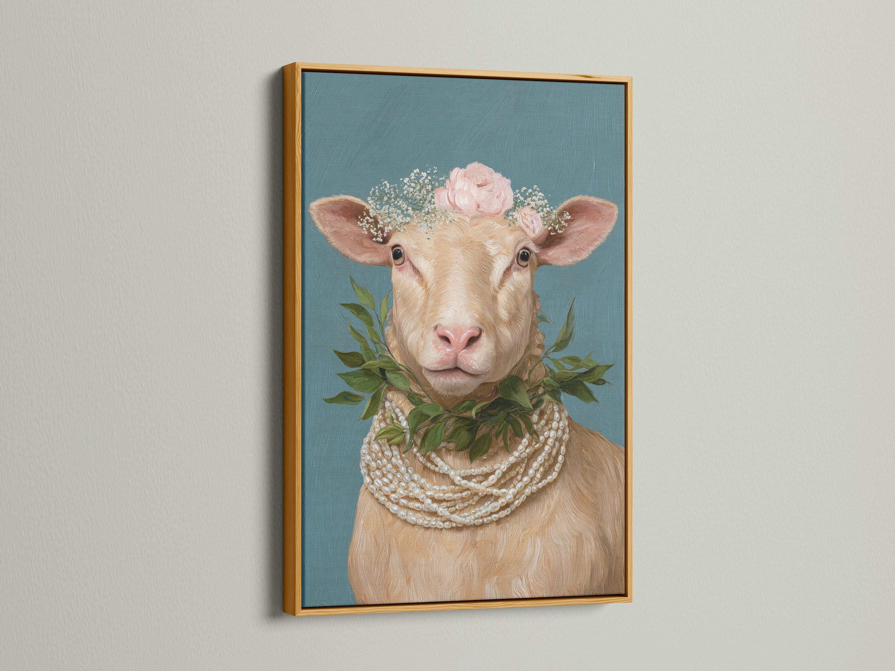 Framed whimsical sheep artwork with a floral crown and pearl necklace. This Country Wall Art is displayed in a gold frame. Perfect Farm Animal Print for Nursery Wall Decor. The gold frame adds elegance to this botanical sheep art.