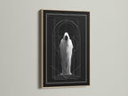 Artwork displayed in an oak frame. The art features a figure in a shroud. Geometric lines accent the piece. The oak frame adds warmth. Explore frame options. Stretched canvas and fine art paper available. Elevate your space with framed artwork.