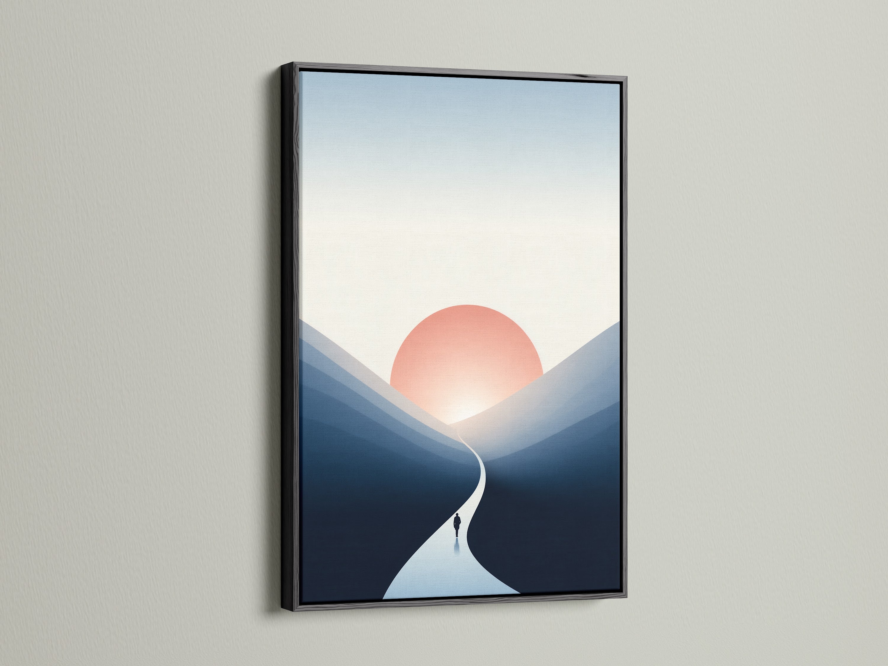 Sunrise Mountain artwork in a black frame. The minimalist landscape print offers a striking contrast. The black frame accentuates the blue and peach tones. This serene artwork is perfect for modern wall art.