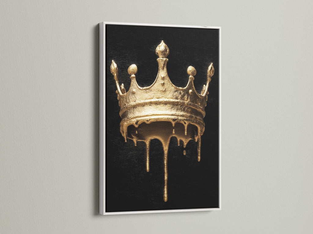 Melting Crown artwork with a white frame. The artwork features a gold melting crown on a black background. The white frame offers a clean modern look. Shop luxury wall art for your home or business today.