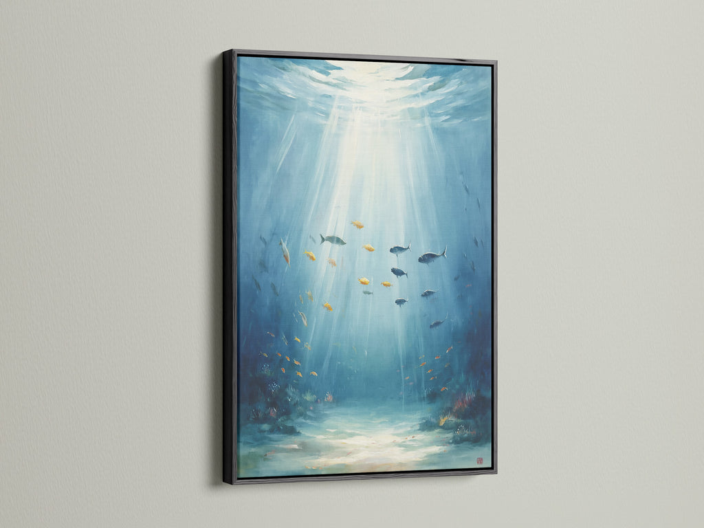 Underwater artwork with a black frame. This ocean canvas print features beautiful sea life. The fish painting adds a touch of aqua blue to your decor. Perfect for coastal wall decor and marine life art.