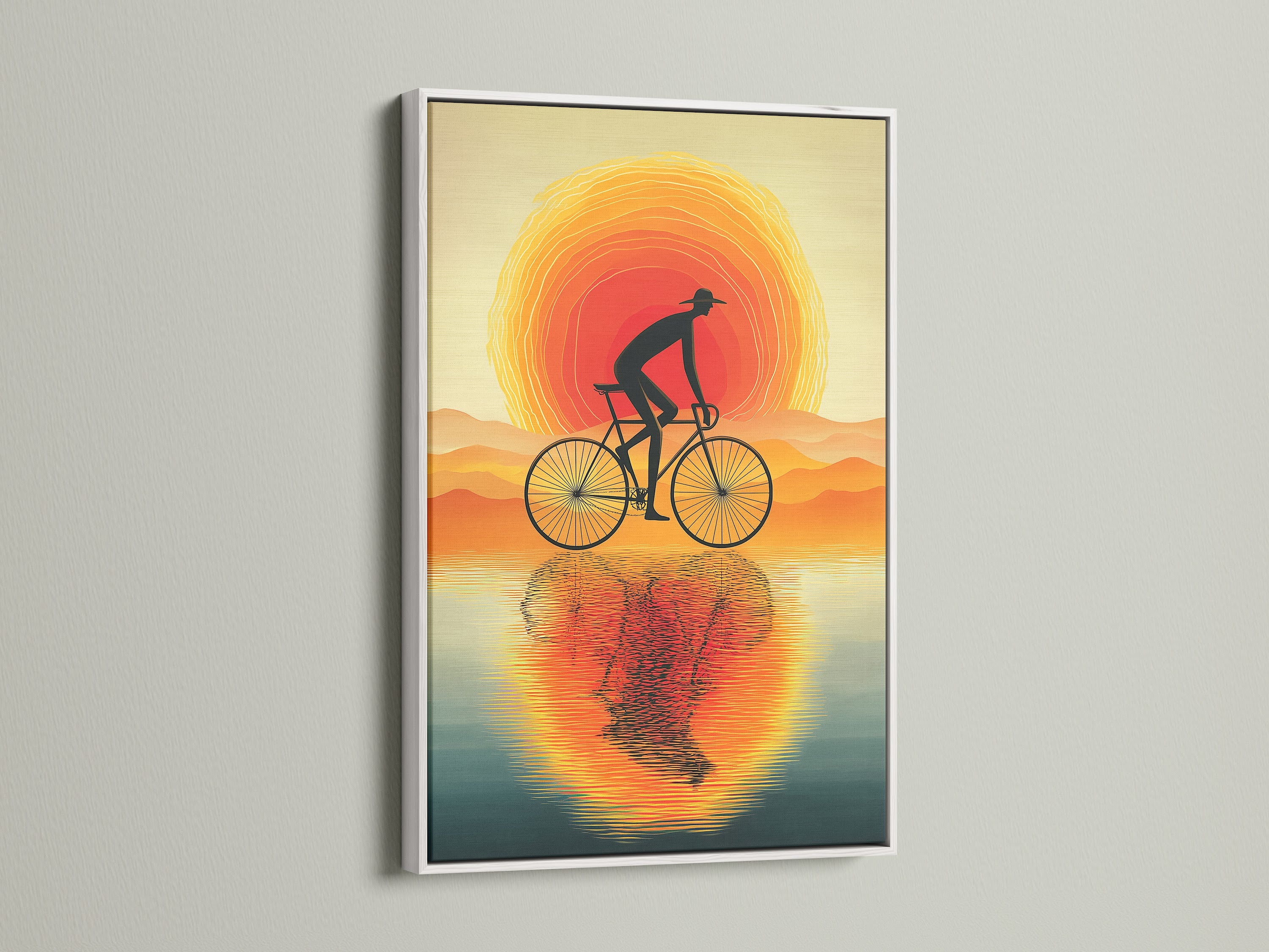 The Sunset Ride artwork is showcased in a white frame. This modern art print brings a clean look to any space. Perfect as biking artwork in bedrooms or offices. It's a sunset reflection captured beautifully.