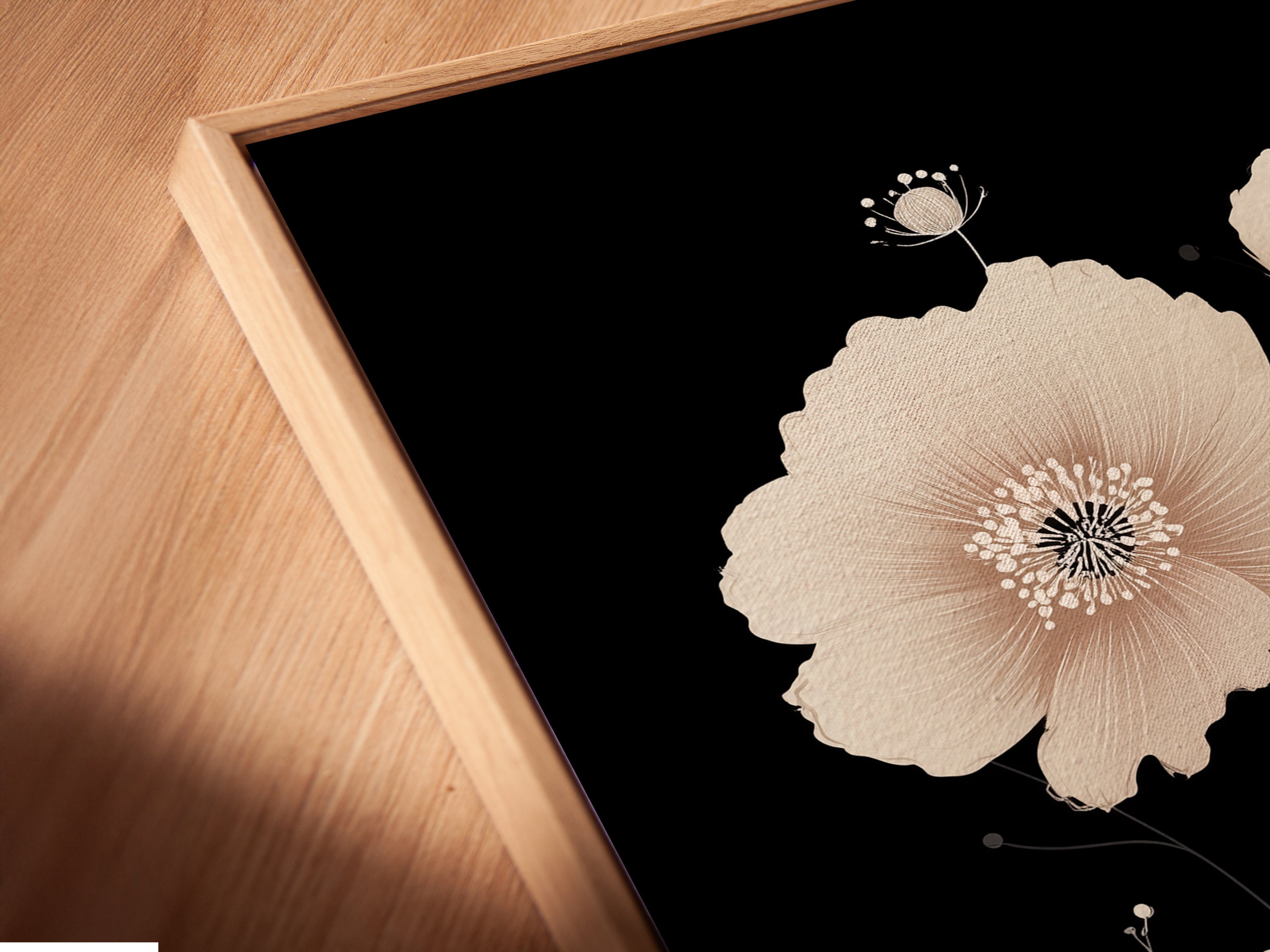 Close-up of a Beige Poppy Flower Canvas Print in a Floating Frame. This angled view highlights the modern design and elegant presentation. The floating frame enhances the minimalist artwork. Perfect for adding a sophisticated touch to your Scandinavian or contemporary decor.