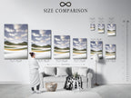 Size comparison chart displayed in an interior setting featuring coastal landscape artwork. Visualize the perfect fit for your space. Choose the ideal size for your beach canvas print. This modern wall art enhances any room. Find the perfect serene nature print for your home decor.