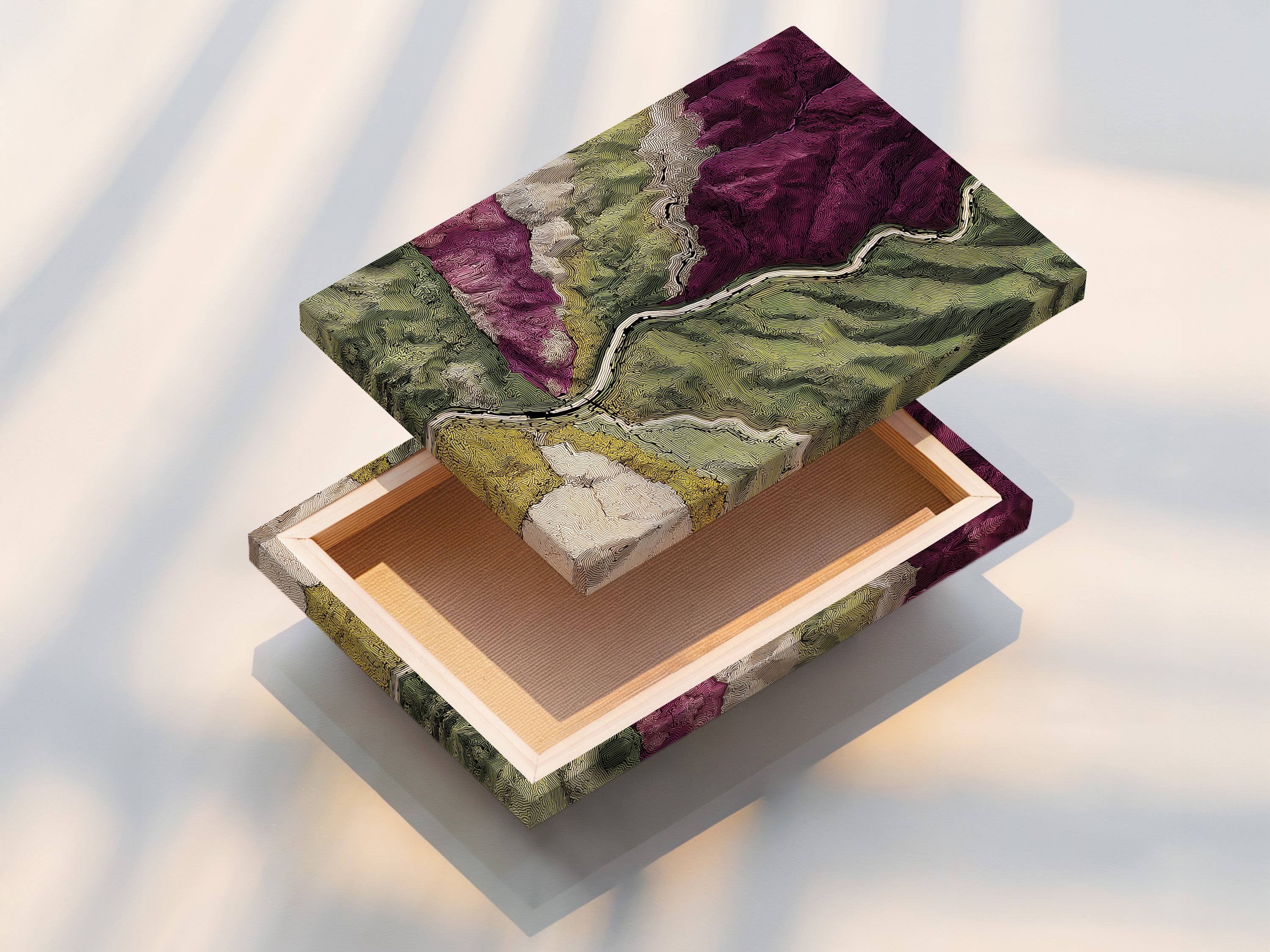 A stretched canvas print is displayed. The artwork is a topographical map. The canvas texture enhances the visual appeal. The print is stretched perfectly over a wooden frame. This product is ready to hang in your home. Enjoy the art without the hassle of framing.