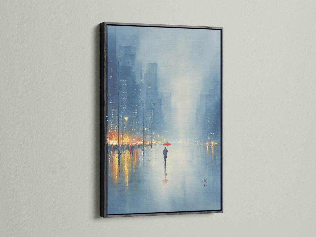 Add sophistication with our cityscape canvas. It is displayed in a black frame. This urban artwork captures a rainy day scene with cool blue tones. Ideal for modern office wall decor or a stylish home gallery. See the impact of city scene art. A perfect blend of contemporary style