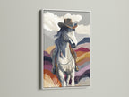 Brighten your walls with this cowboy artwork in a white frame. This western wall art adds a touch of southwestern charm to any room. Ideal for rustic decor this horse canvas art complements your western home decor.  