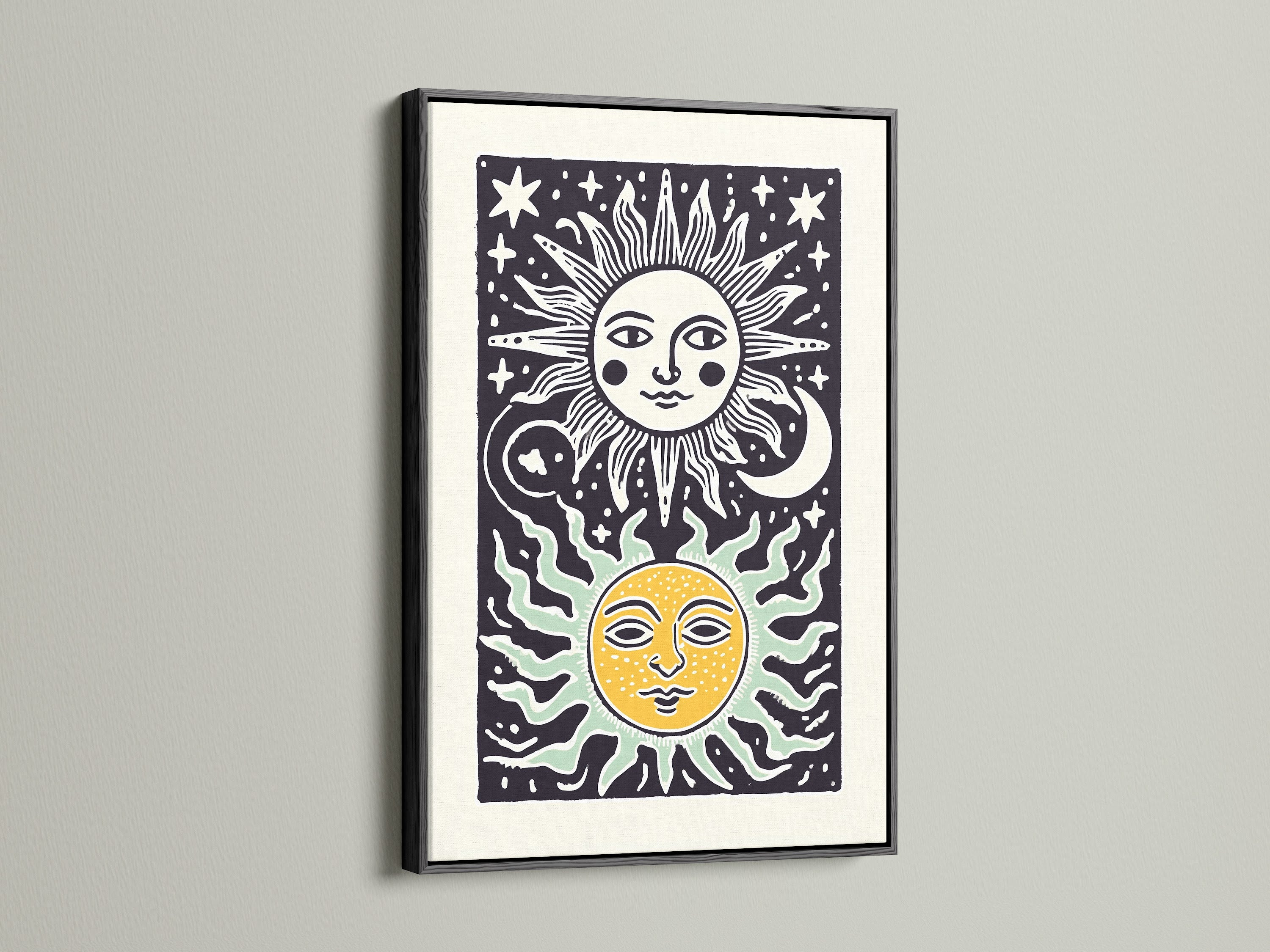 Black frame displays sun and moon art. The frame adds sophistication. The artwork is framed on a white wall. It is a striking contrast and makes the art pop. The frame enhances the art piece. It is a great addition to any room.