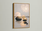 Abstract Zen artwork in a gold frame. This serene artwork creates a calming atmosphere. It's perfect for spa wall art or meditation decor. The neutral tones complement a variety of interior styles. Bring peaceful art to your mindful decor with this zen wall decor.