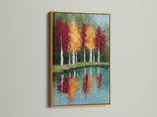 Add a touch of luxury with framed autumn trees artwork with a gold frame. Reflected landscape wall art includes a teal blue lake painting. The gold frame brings warmth to your space. Ideal for living rooms bedrooms offices and studios.