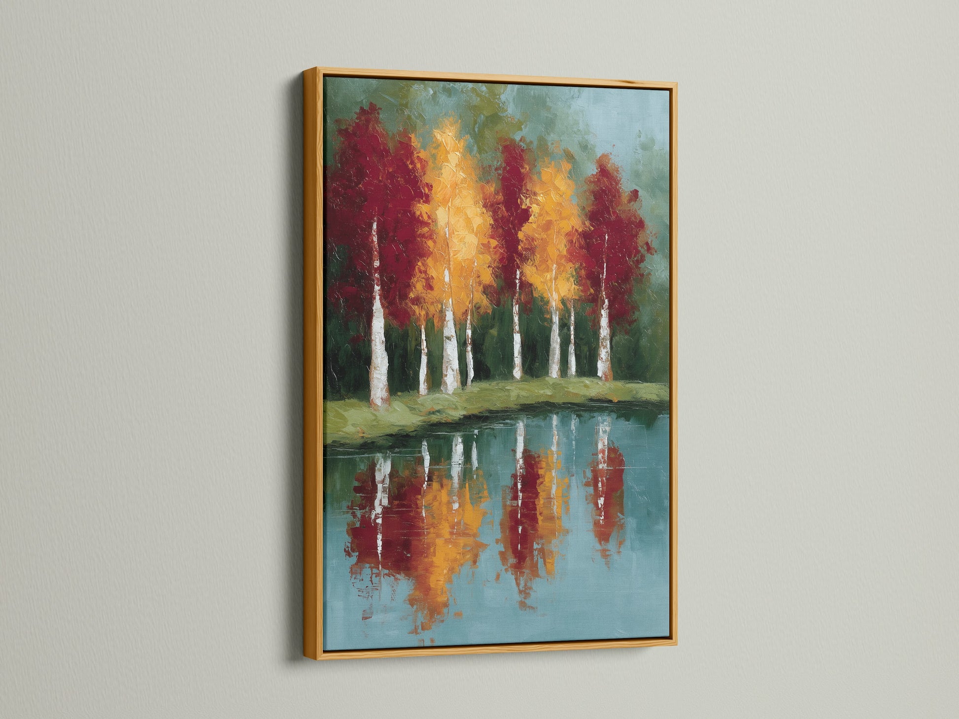 Add a touch of luxury with framed autumn trees artwork with a gold frame. Reflected landscape wall art includes a teal blue lake painting. The gold frame brings warmth to your space. Ideal for living rooms bedrooms offices and studios.