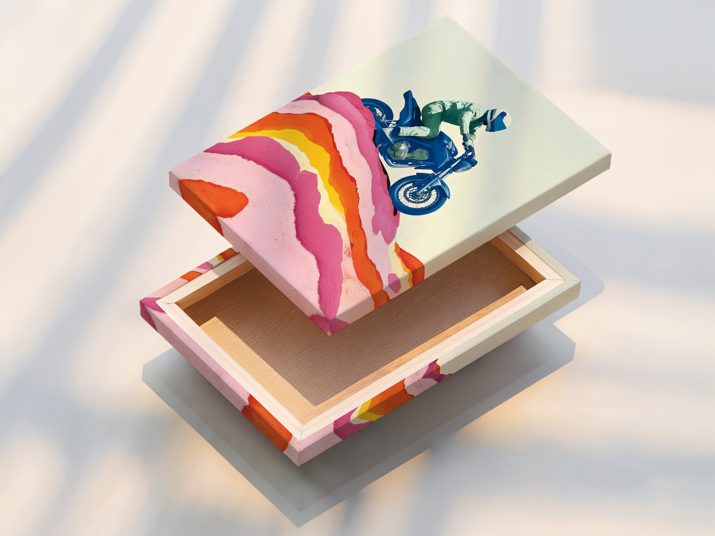 A stretched canvas print showcasing vintage motorbike art. This motorcycle art print adds a retro touch to any room. The artwork features a blue motorcycle and pink accents. Perfect for garage decor and man caves.