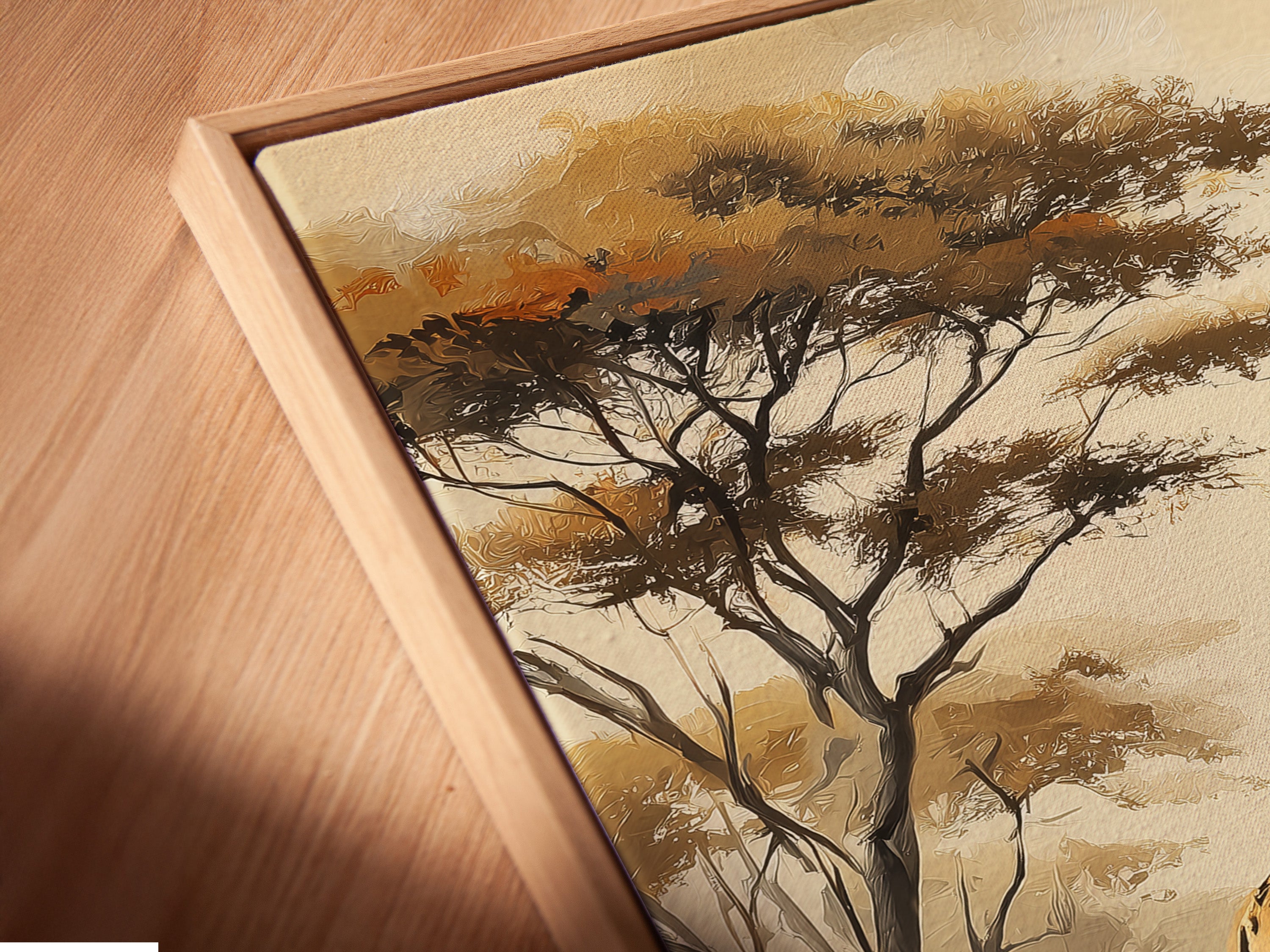 Angled close up of artwork in floating frame. This artwork features a mother and baby giraffe. The floating frame gives the artwork a modern look. A floating frame enhances depth to the artwork. Find the perfect frame to suit your decor style.