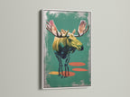 Artwork of a moose in a white frame. The white frame creates a clean and modern look. The artwork is matted and ready to hang. Brighten your walls with a fresh and stylish piece. Elevate your home decor with framed artwork.