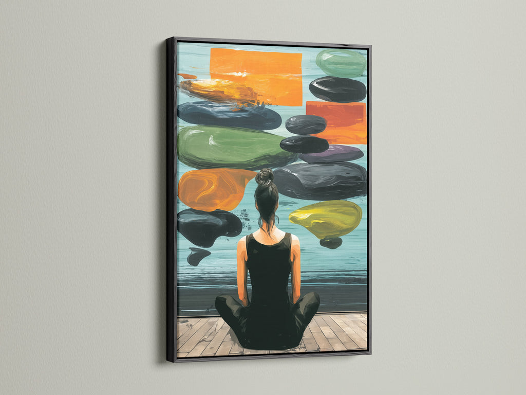 Zen Wall Art in a black frame is displayed on a white wall. This artwork features a woman meditating. The artwork creates a peaceful atmosphere. This art is perfect for creating a serene space.
