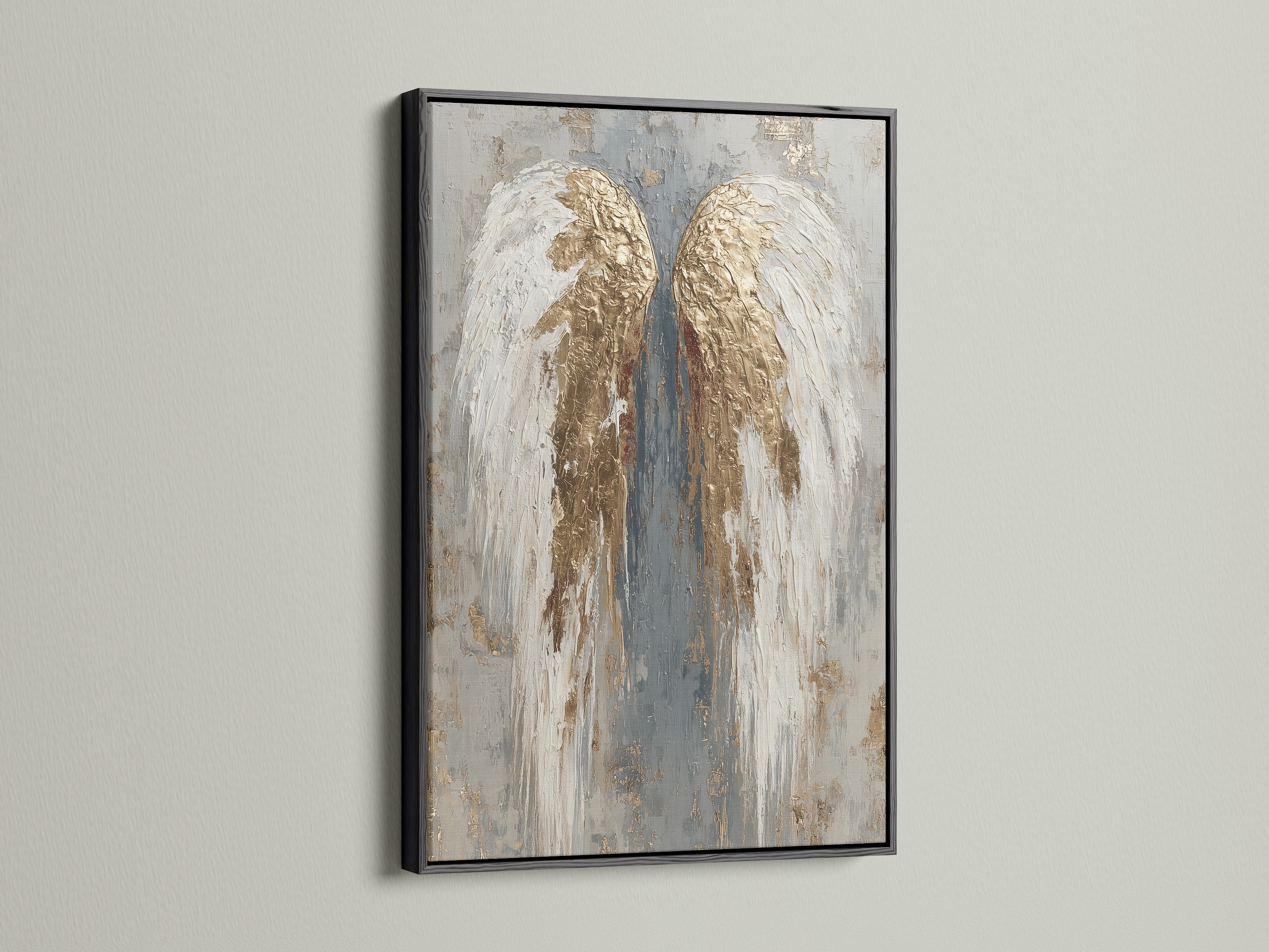 The angel wings artwork is encased in a black frame. The artwork is displayed on a white wall. The black frame provides a bold and sophisticated aesthetic. It creates a striking contrast. This adds drama to the artwork.