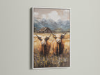Farm animal artwork featuring a highland cow in a white frame. This canvas print enhances farmhouse decor with its rustic charm. Ideal for creating a cozy country home atmosphere.