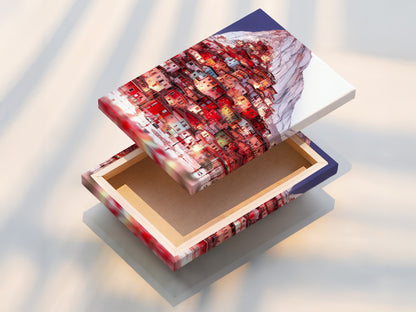 A stretched canvas print of the Mountain Village artwork is ready to hang. This mountain canvas brings European charm to your home. Perfect for living room wall art or office wall art.