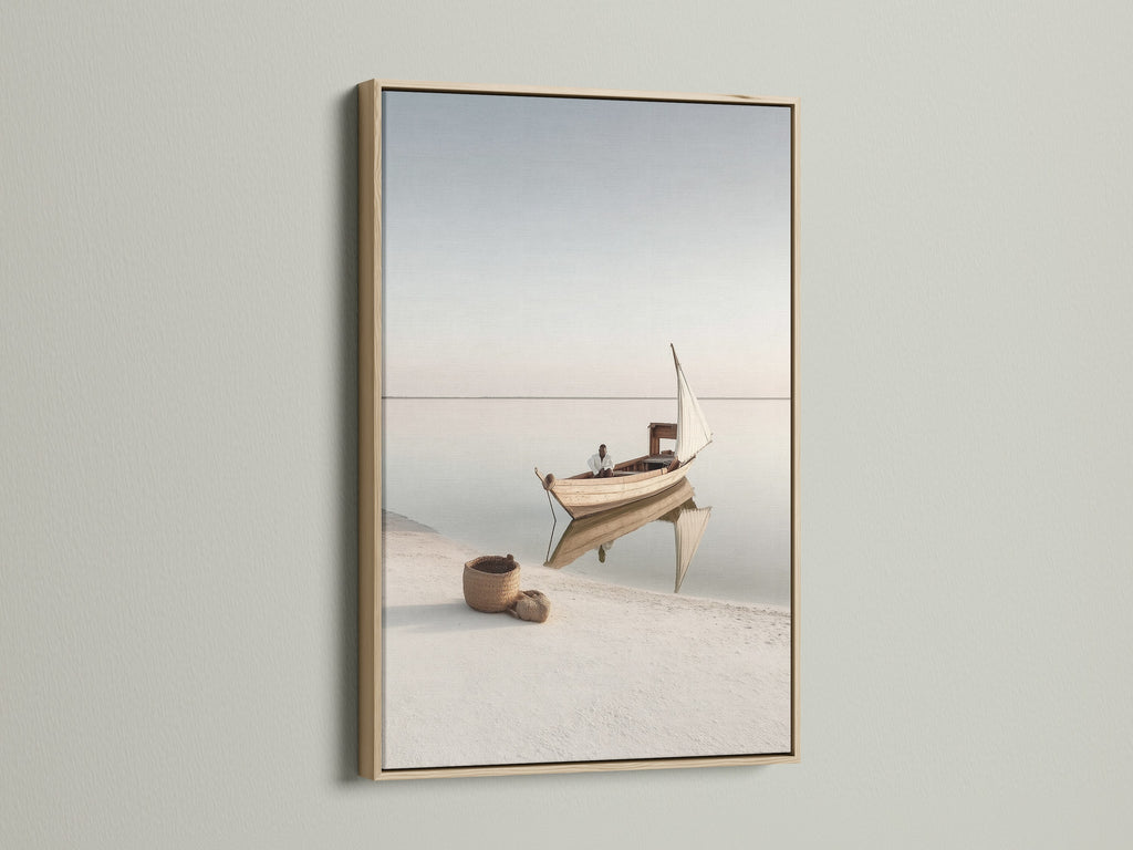 Sailboat Canvas Print in an oak frame. Enhance your space with this neutral coastal canvas. A minimalist nautical print that brings a beachy vibe to any room. The ocean view is so calming.