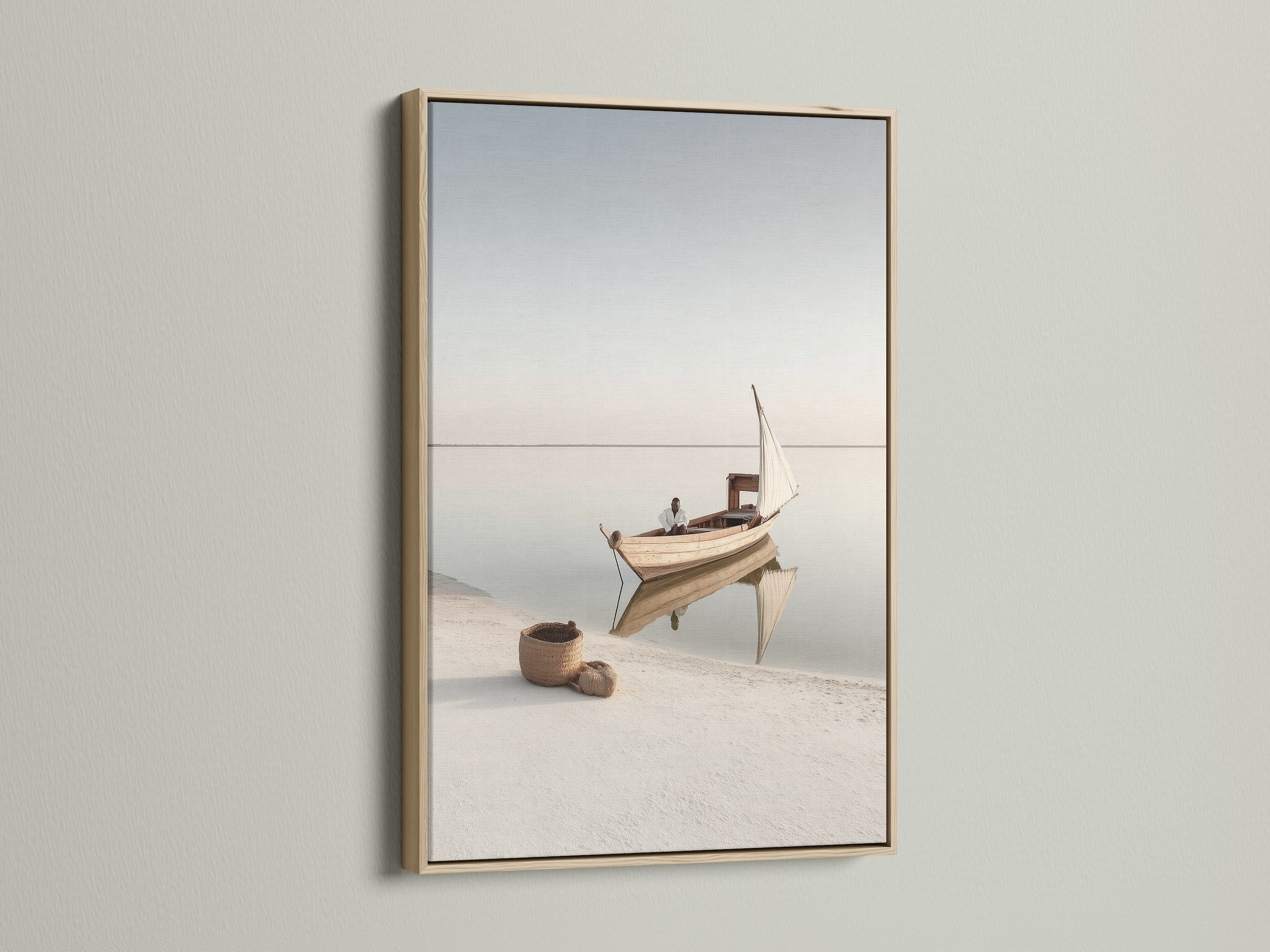 Sailboat Canvas Print in an oak frame. Enhance your space with this neutral coastal canvas. A minimalist nautical print that brings a beachy vibe to any room. The ocean view is so calming.