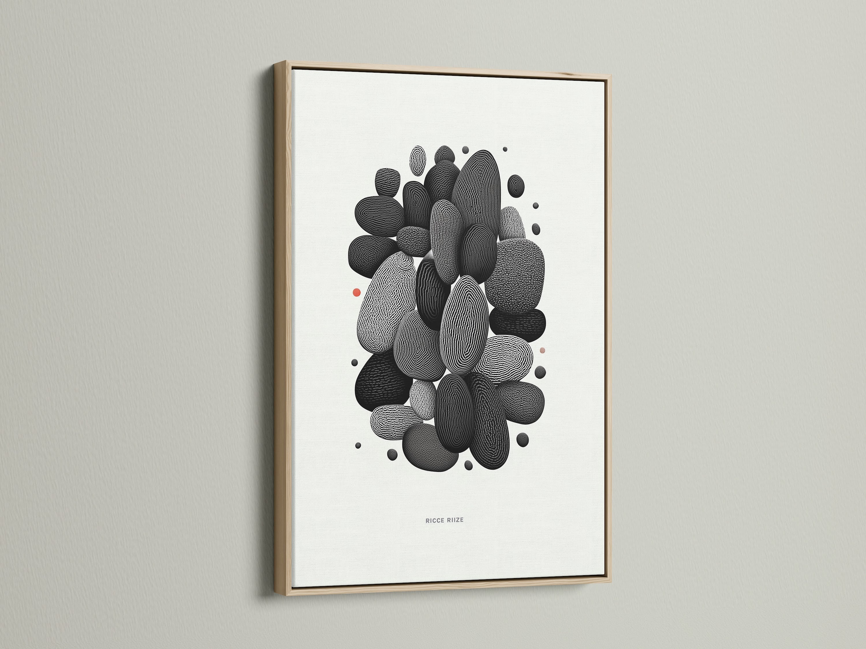 Abstract Pebble artwork displayed in an oak frame. The minimalist black and white design brings modern elegance. Ideal wall art for living rooms bedrooms or offices. This stone artwork complements neutral and scandi style decor.