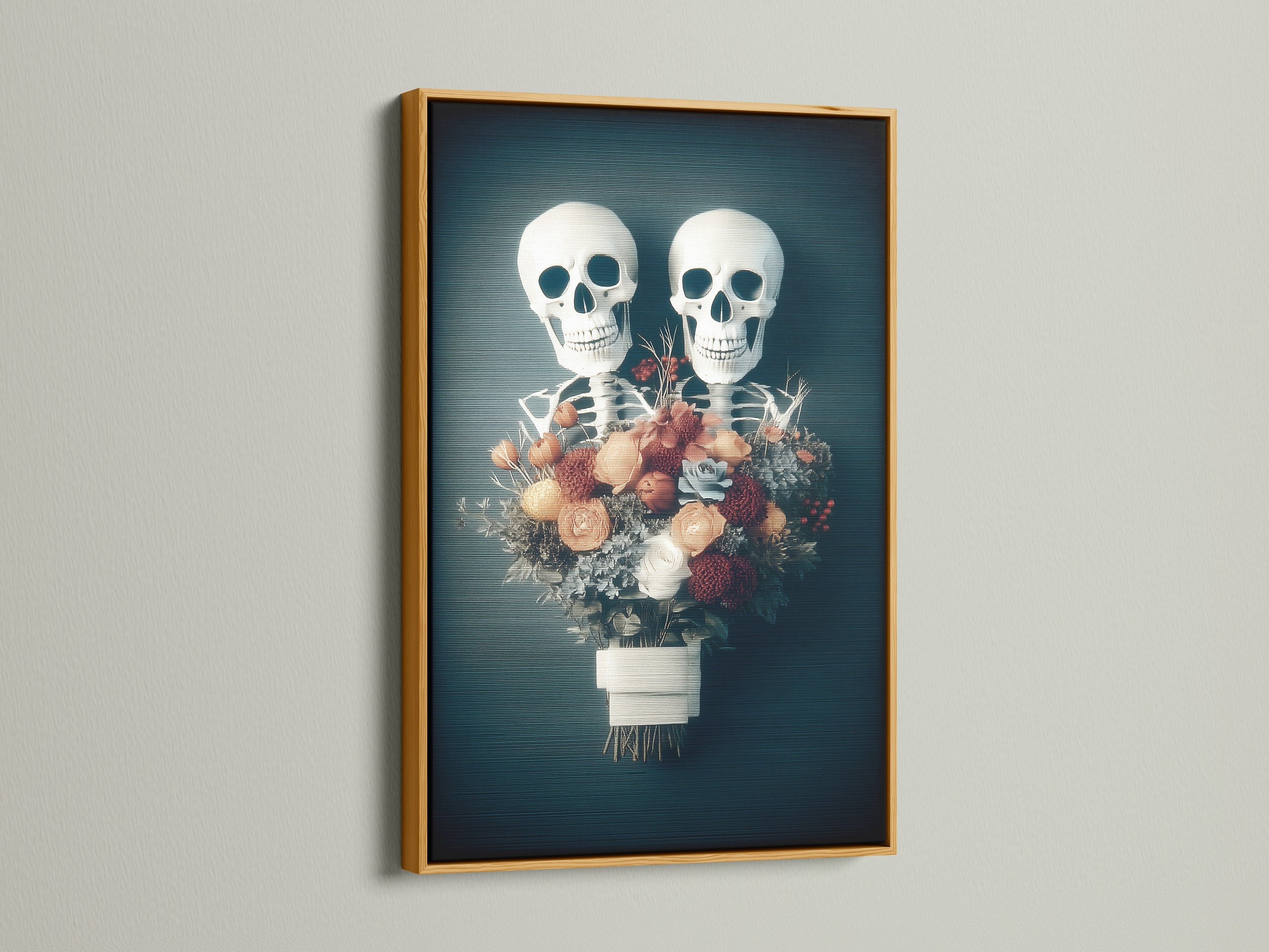 Floral skeleton artwork displayed in a gold frame. The gold frame adds a touch of elegance to this gothic macabre piece. It is perfect for Halloween decor or a dark academia setting. The artwork features a spooky yet beautiful floral skull. It is ideal for those who appreciate unique and bold artwork.