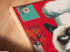 A close-up angled view of the canvas print in a floating frame. This unique art piece enhances any space. The floating frame adds a modern touch. Perfect for displaying the Chef Cat Wall Art in your home.