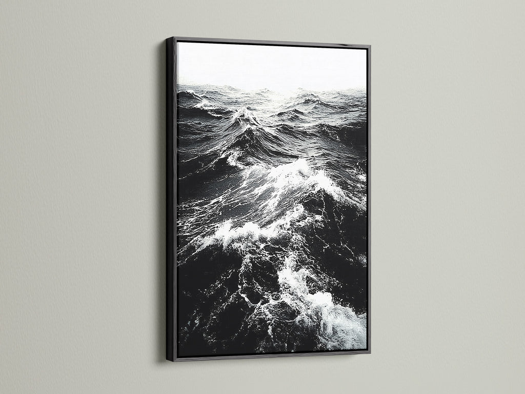 A black frame displays black and white ocean wave artwork. This classic frame creates a dramatic effect. Ideal for monochrome art and ocean photography. Enhance your living room wall art today explore our options.