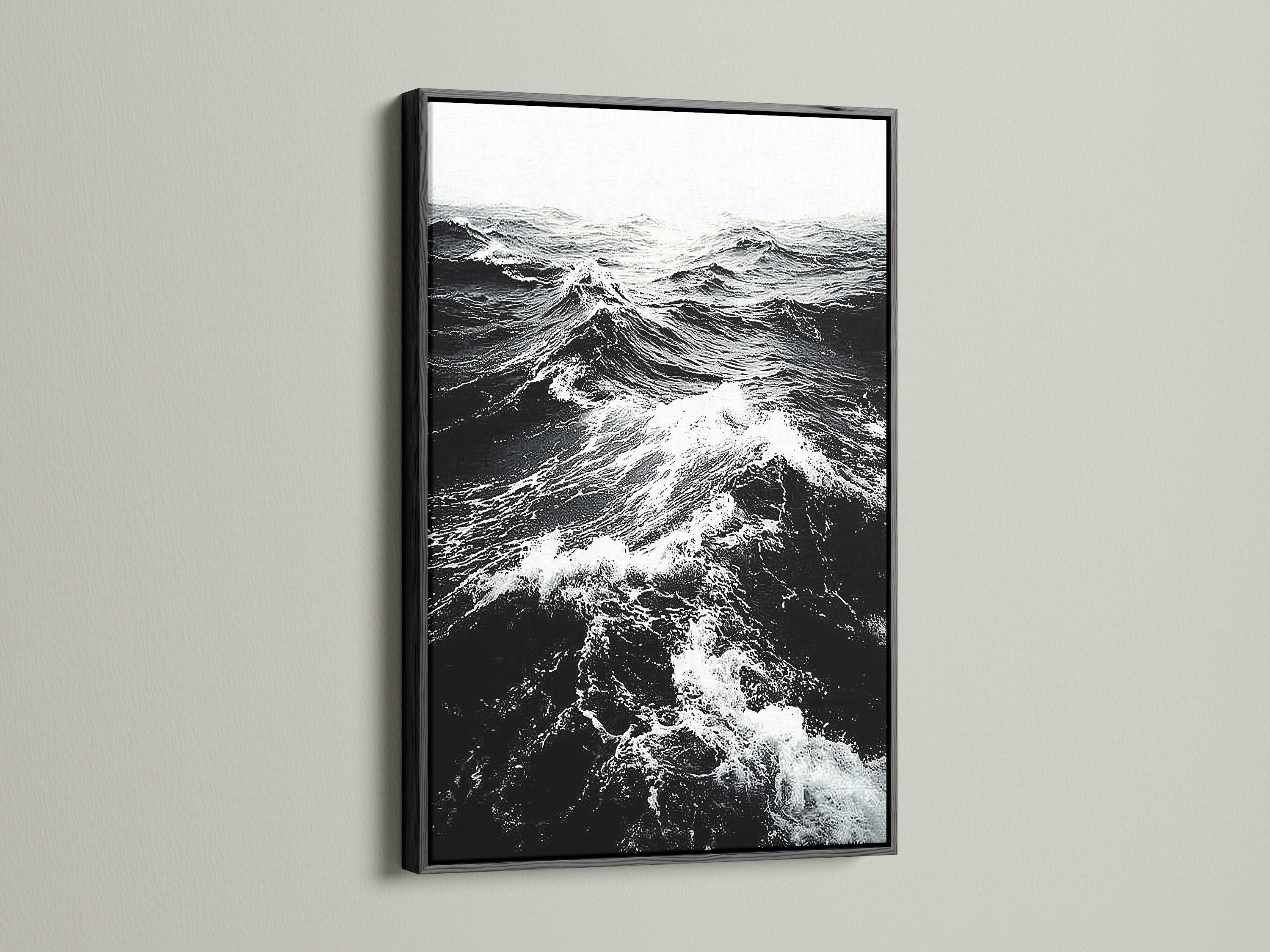 A black frame displays black and white ocean wave artwork. This classic frame creates a dramatic effect. Ideal for monochrome art and ocean photography. Enhance your living room wall art today explore our options.
