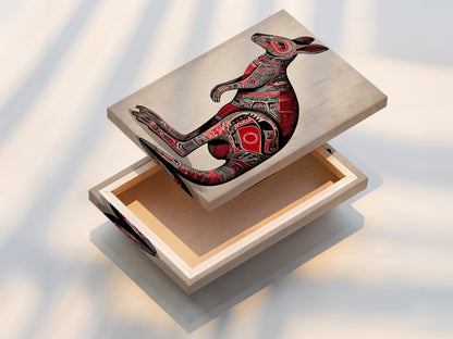 A stretched canvas print of the Aboriginal Kangaroo artwork. The canvas texture enhances the tribal art details. The kangaroo is rendered in vibrant red and black. Ready to hang this piece adds cultural flair to any space. Perfect for bohemian decor.