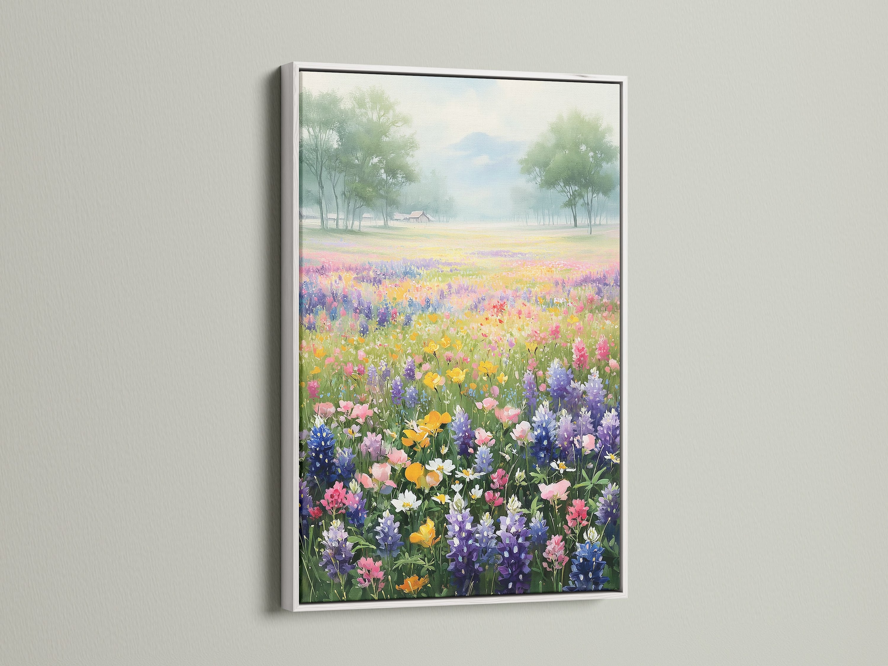 A vibrant wildflower field artwork is presented in a white frame. This colorful field art enhances your home decor. The flower meadow print captures the beauty of nature. Add a floral landscape to your bedroom or living room.