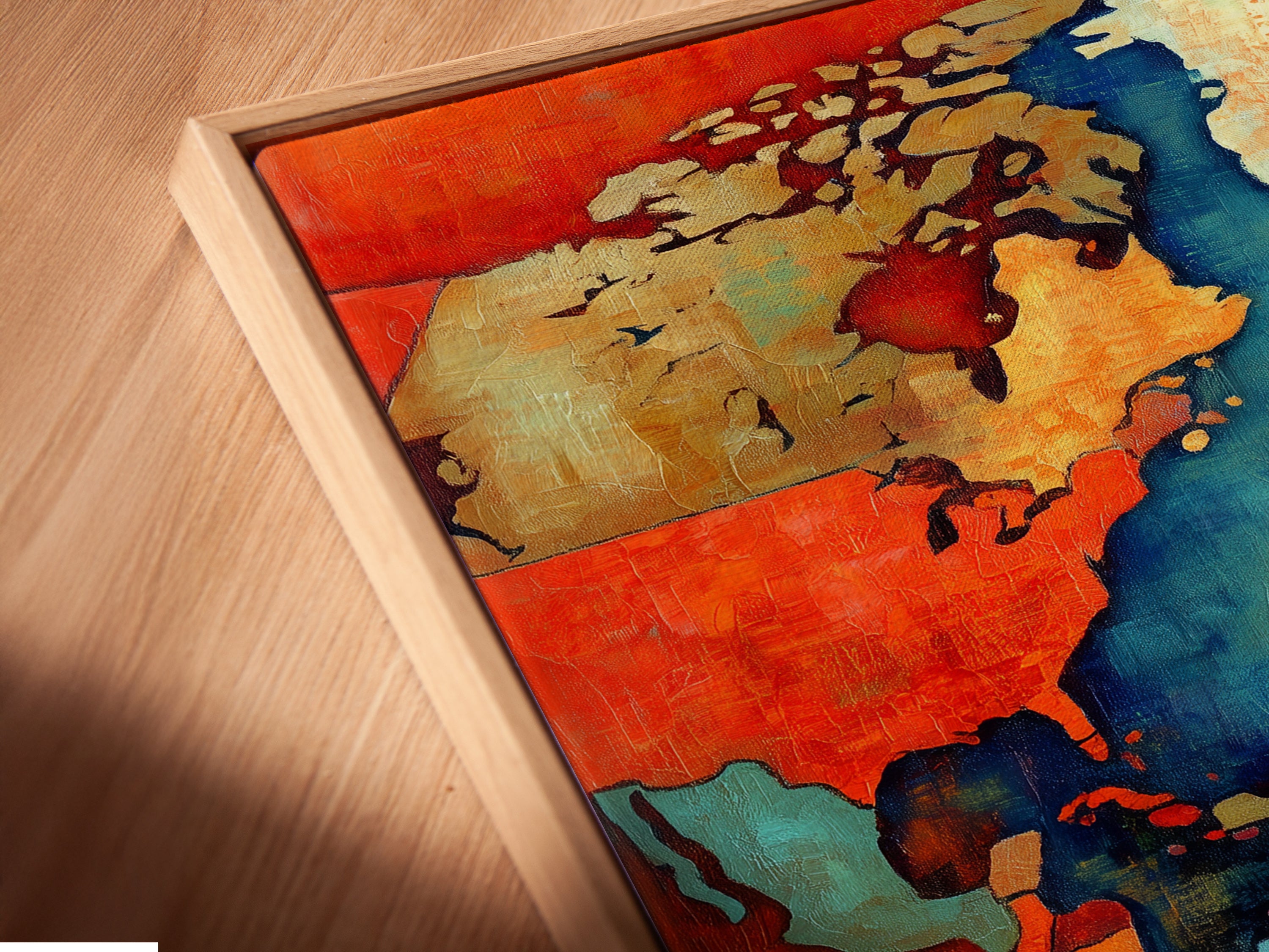 A close-up shows a canvas print in a floating frame. The vintage world map artwork features nautical charts. The teal and coral colors blend beautifully. This piece is perfect for adding character to any room. It is ideal for those who love travel and art.