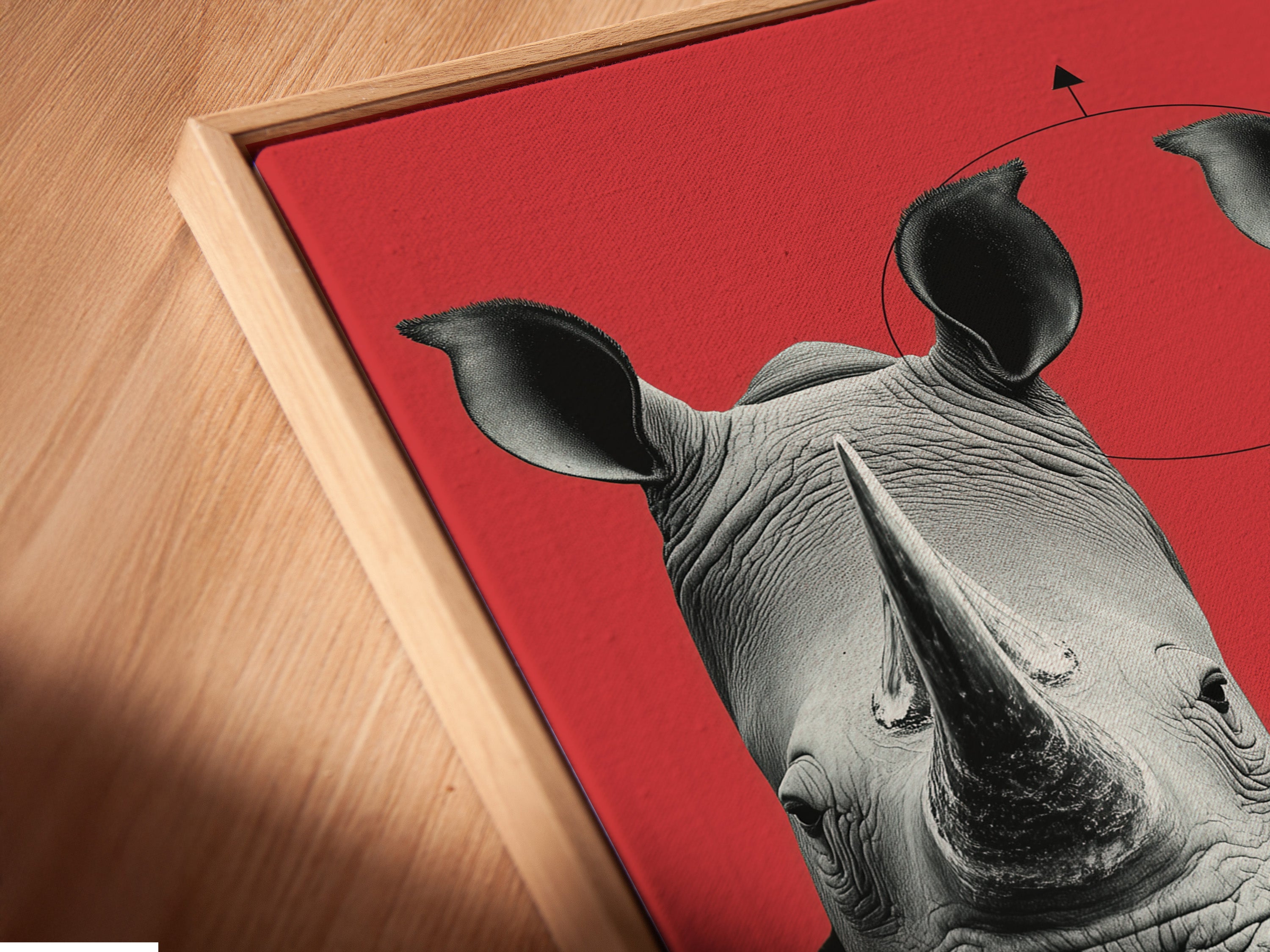 Close-up of a Rhino Business Suit canvas print in a floating frame. The angled view showcases the fine details of this animal artwork. The floating frame adds a contemporary touch. This piece is perfect for modern home decor.