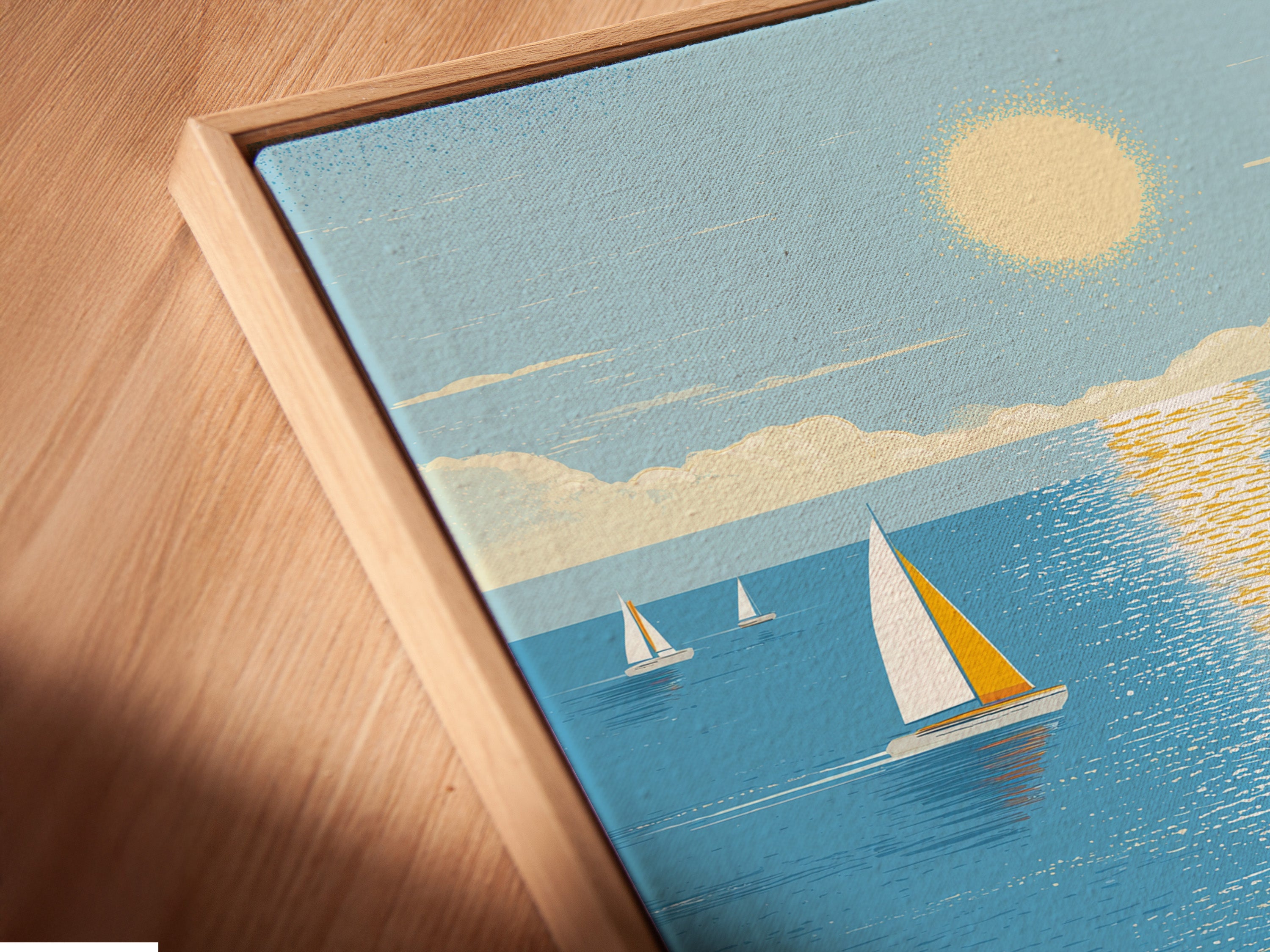 Close-up of a canvas print in a floating frame. This beach scene artwork is ready to hang. The coastal wall art adds sophistication. Perfect for creating a relaxing coastal home decor theme.