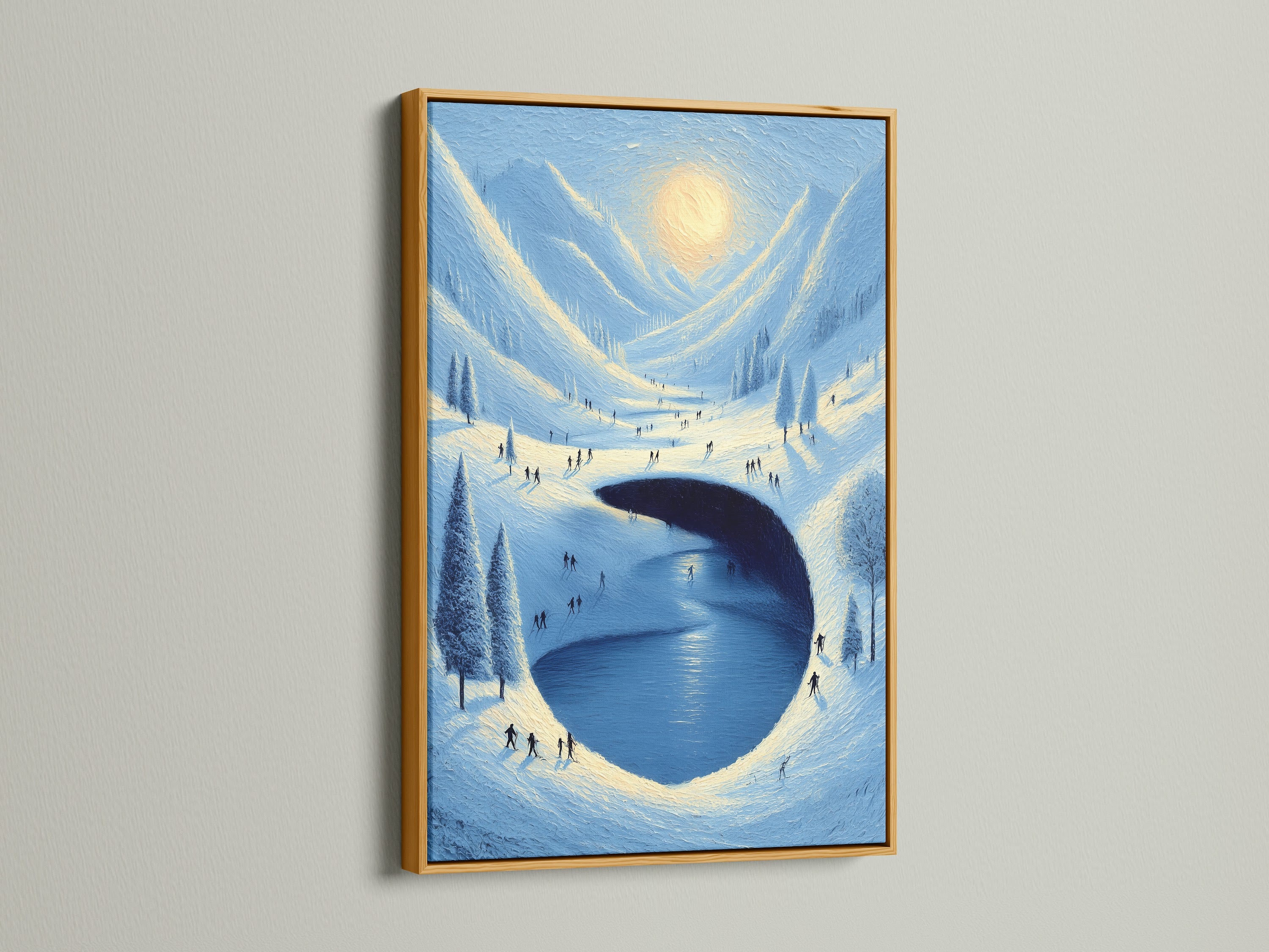 The gold frame adds a touch of elegance to this winter artwork. This is a snowy mountain print showcasing a serene lake. It would make a stunning statement piece for a ski lodge. Bring nature indoors.