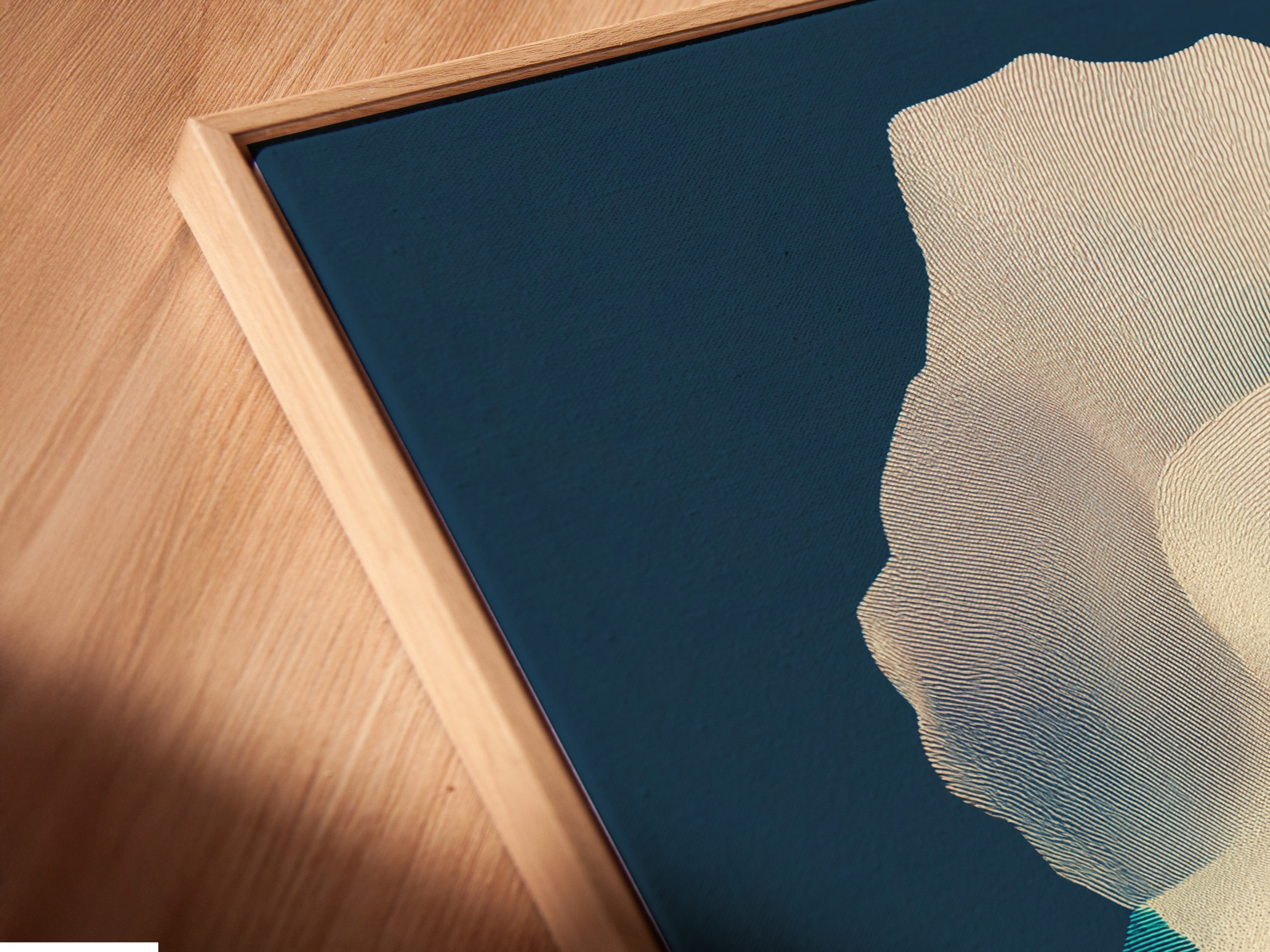 Close-up of a canvas print in a floating frame. The frame gives the illusion of floating art. This modern style enhances any artwork. See the detail and craftsmanship in this design. It adds depth and dimension to your walls.