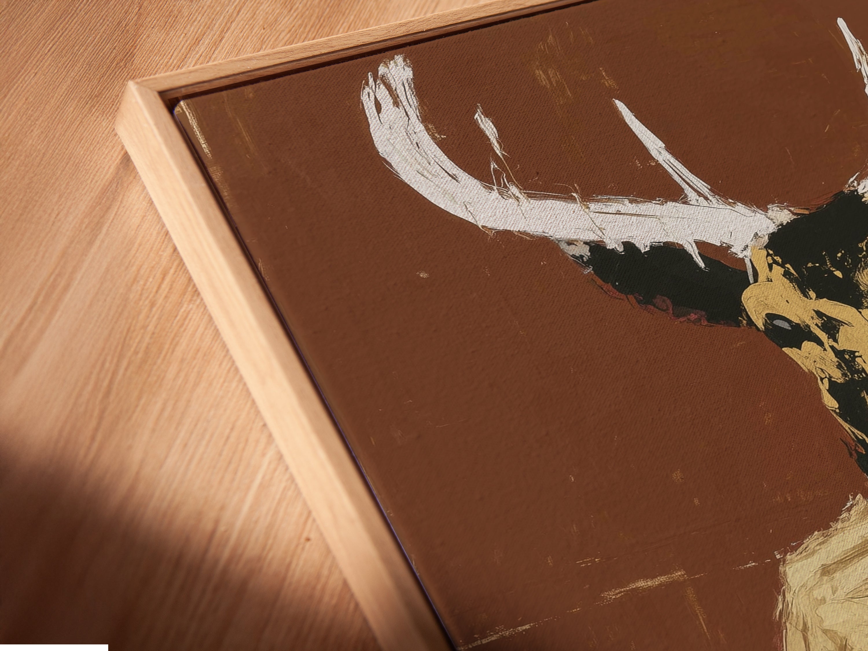 Angled close up of a canvas print in a floating frame. Discover the elegance of this stretched canvas print. Its floating frame enhances the Deer Gentleman artwork. Perfect for modern wall art. Elevate your home decor with this sophisticated piece. Ideal for contemporary art lovers seeking unique wall art solutions.