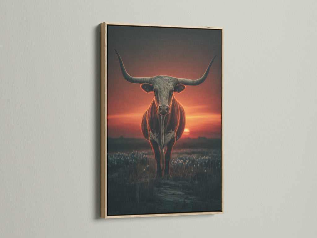 Longhorn bull art printed in an oak frame. The artwork captures a western sunset. It's ideal for adding a rustic touch to your home. This bull canvas print enhances any ranch style decor. A great piece of cowboy wall decor.