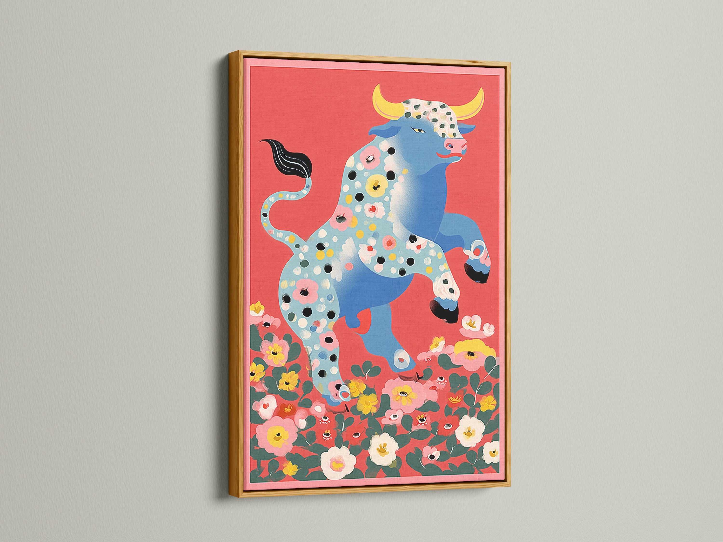 Floral Bull artwork in a gold frame. This retro canvas offers a vintage style for living room walls. The gold frame accentuates the colorful bull with floral accents. The animal artwork is a statement piece for art collectors. Its folk art charm fits seamlessly into farmhouse decor.