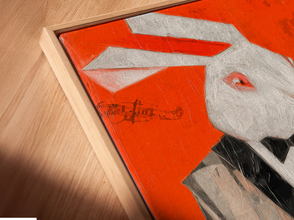 A close-up angled view shows a canvas print in a floating frame. The artwork features a rabbit pianist. The contemporary style and abstract design make it a perfect addition to any home bar or music room. This piece adds character and charm to any space.