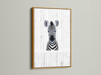 A stunning Baby Zebra artwork presented in a gold frame. This elegant animal print is perfect for kids room decor. The gold frame adds a touch of sophistication to the zebra poster. A beautiful piece for a safari nursery.