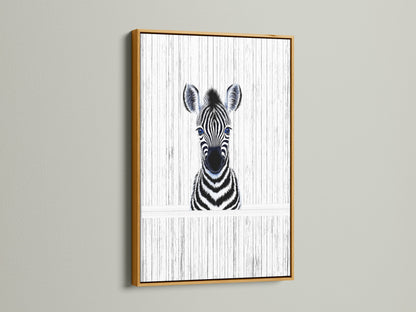 A stunning Baby Zebra artwork presented in a gold frame. This elegant animal print is perfect for kids room decor. The gold frame adds a touch of sophistication to the zebra poster. A beautiful piece for a safari nursery.