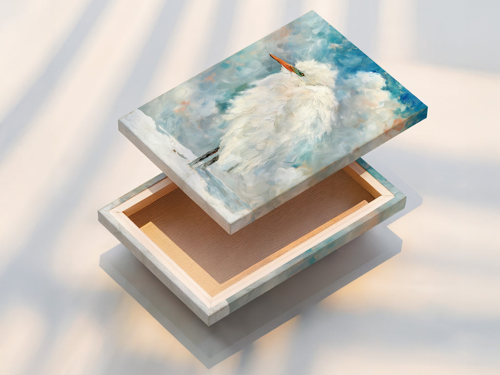 This is a stretched canvas print of the Heron artwork. The print brings coastal charm to your home. This piece is ready to hang. Explore our wildlife art options online