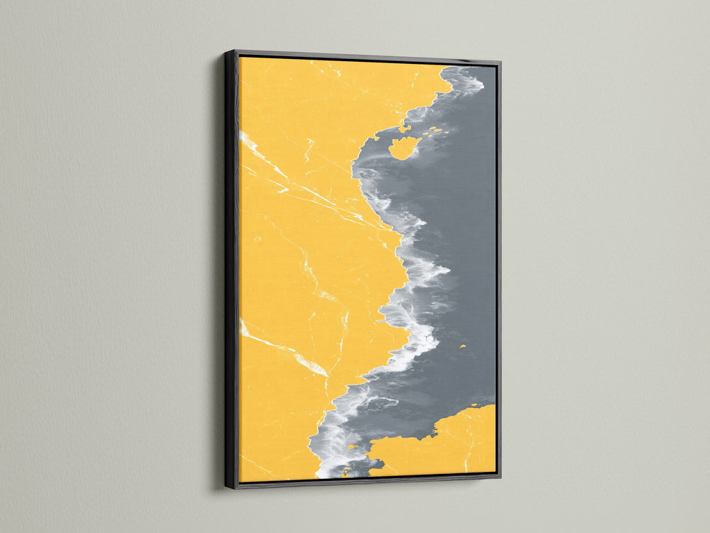 Abstract Coastline Canvas Print with a sleek Black Frame. This modern artwork features a striking contrast of mustard yellow and gray. Ideal for a contemporary aesthetic. This seascape art will enhance your living space.