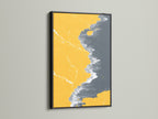 Abstract Coastline Canvas Print with a sleek Black Frame. This modern artwork features a striking contrast of mustard yellow and gray. Ideal for a contemporary aesthetic. This seascape art will enhance your living space.