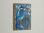 This kingfisher artwork shines in a gold frame. The blue bird print adds elegance to any room. This avian artwork is perfect for contemporary homes. The nature artwork enhances minimalist decor