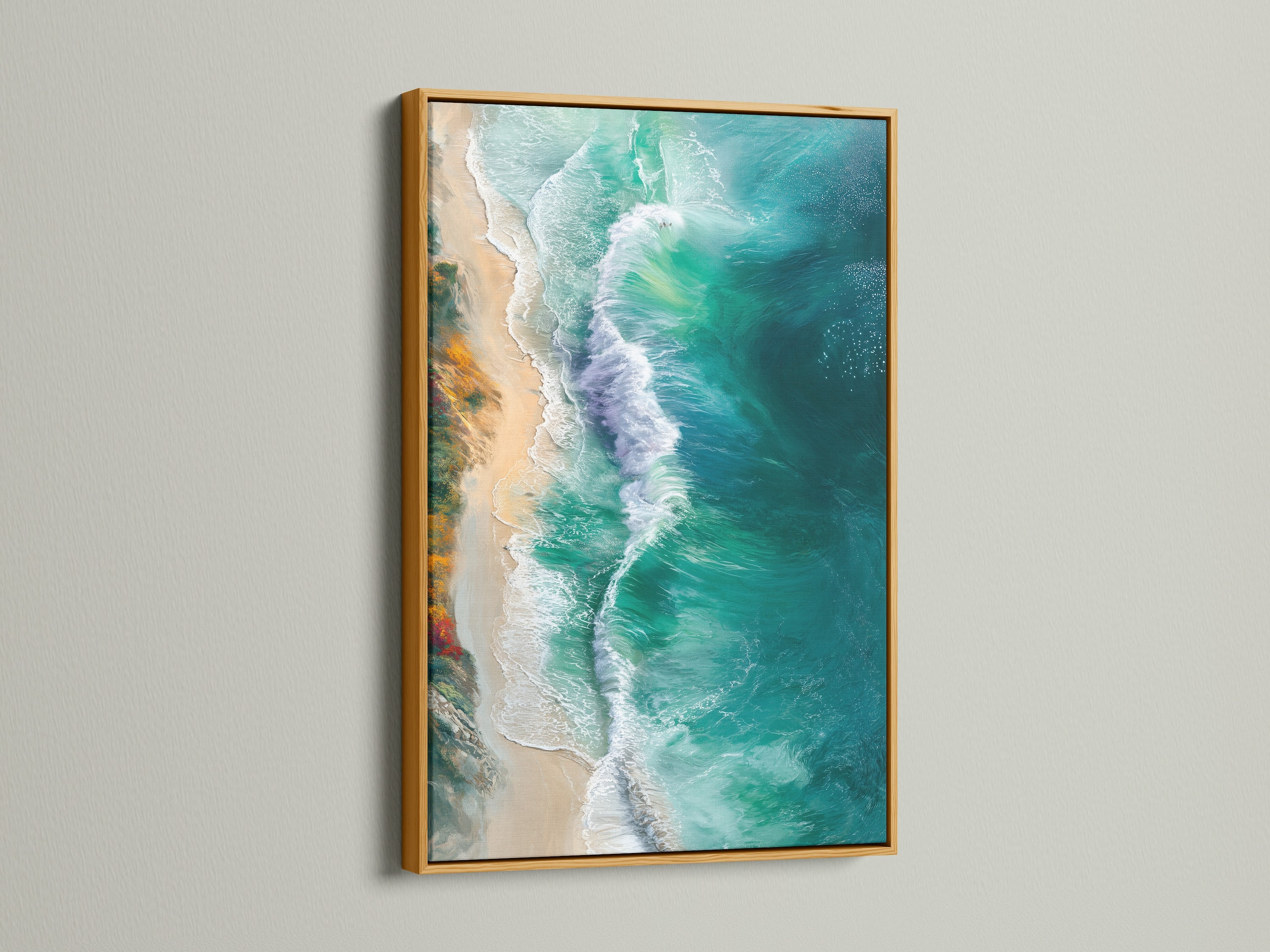 The gold frame highlights the turquoise and teal tones of the aerial beach photography. This ocean waves artwork brings a touch of luxury. It enhances any coastal or tropical themed space.
